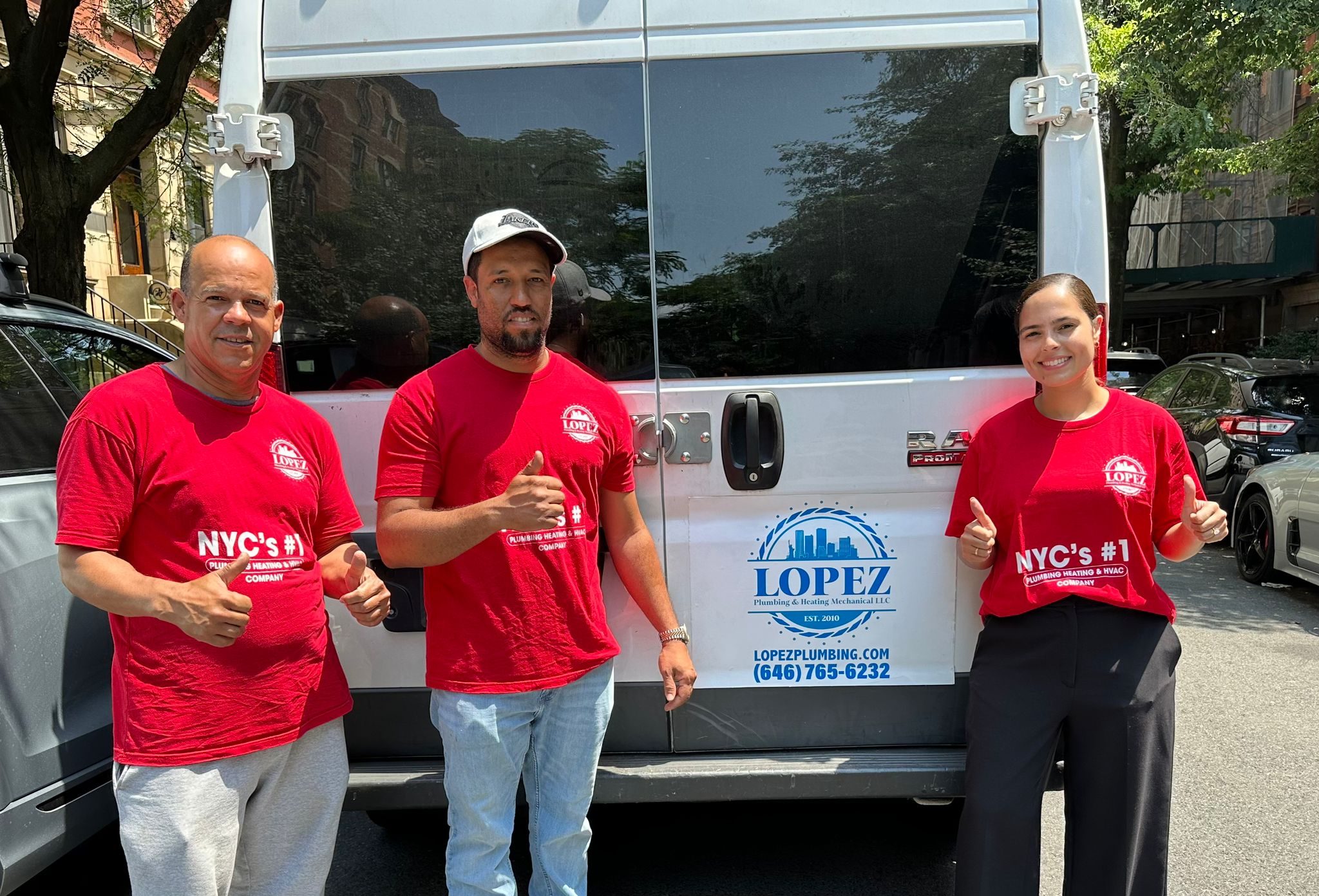 Lopez Plumbing team with their branded van