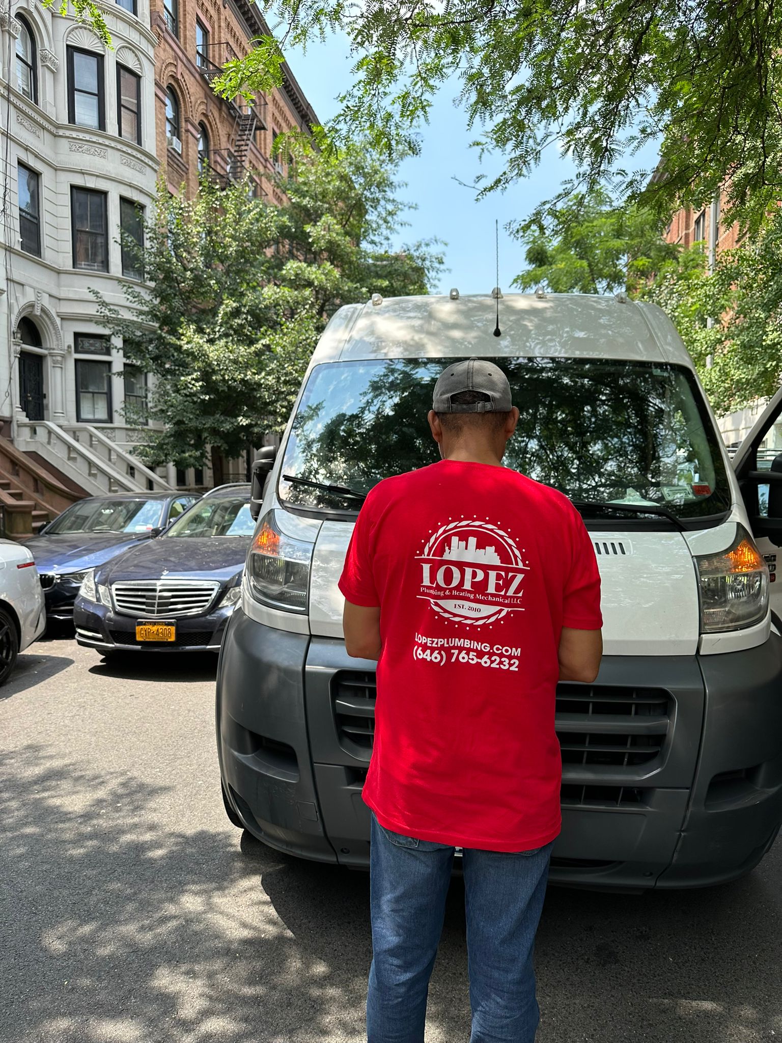Lopez Plumbing technician on the job in New York